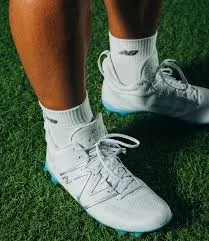 Lacrosse Equipment Buying Guide for Beginners Cleats or turf shoes
